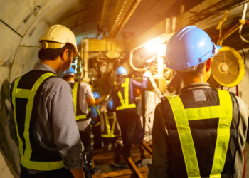 Engineers working, tunnel