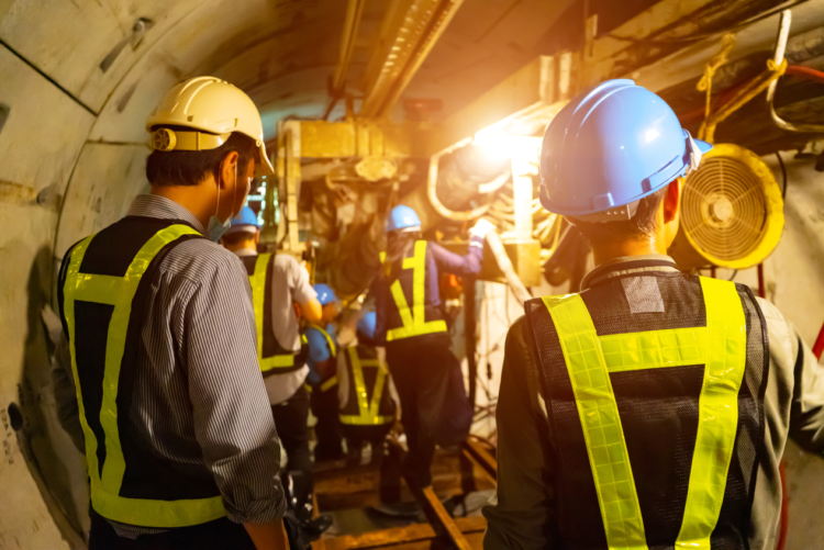 Engineers working, tunnel