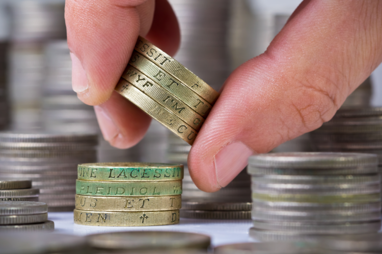 Pay increase, money, pound coins, wage rise