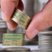 Pay increase, money, pound coins, wage rise