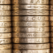 Stack of British pound coins, money, savings, pension